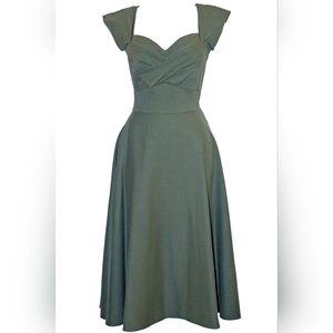 Stop Staring! Swing dress in olive houndstooth